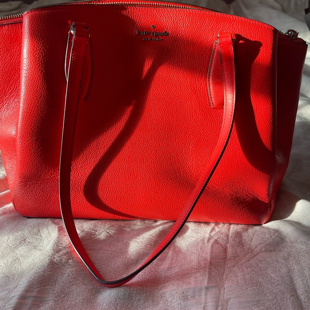 Large Kate spade tote bag the most beautiful red! Needs a new home.